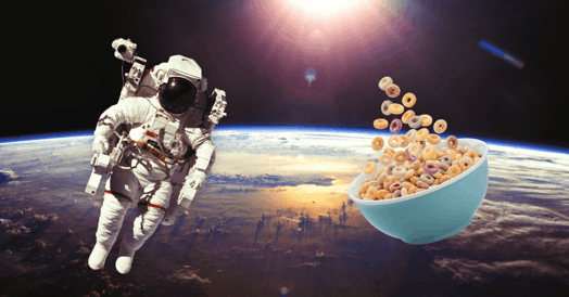 An astronauts floats above Earth next to a bowl of cereal.