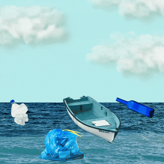 A boat collects trash from the ocean's surface