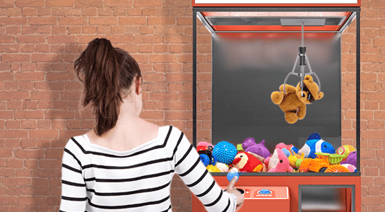 Impossible Claw Illustration: A woman in a striped shirt stands before a red claw machine labeled 