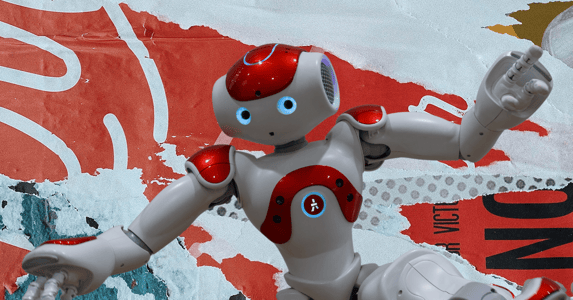 A red and white robot dancing.