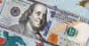A $100 bill. Benjamin Franklin is smiling.