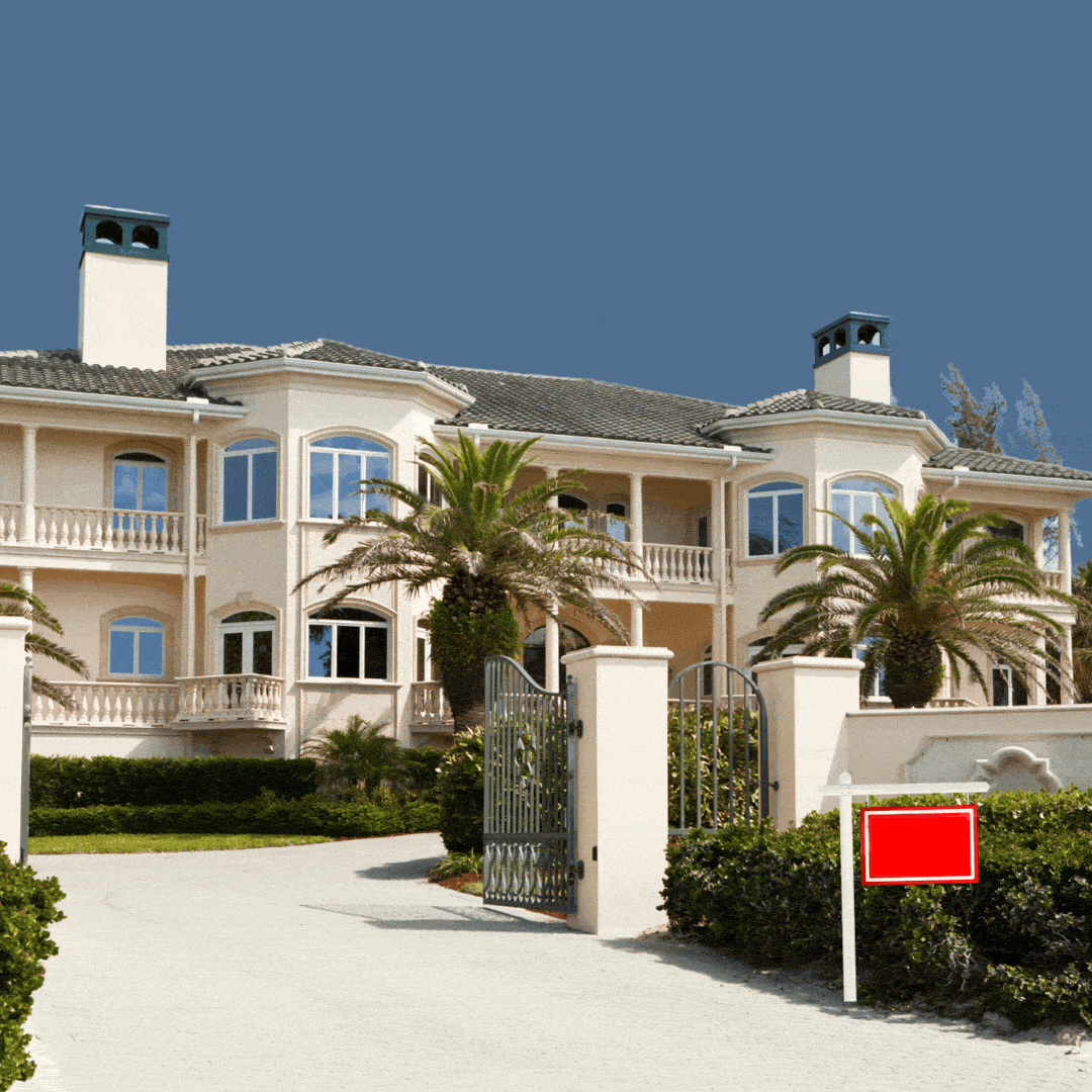 A house with a for sale sign out front showing $$$