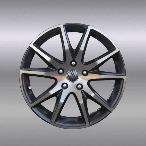 A metal wheel rolling on a silver background