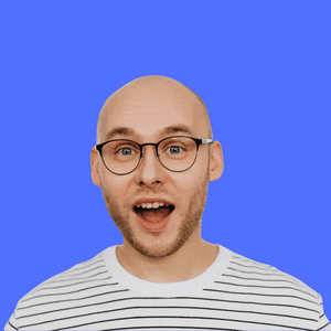 Blonde hair grows on a formerly bald man with a surprised expression on his face.