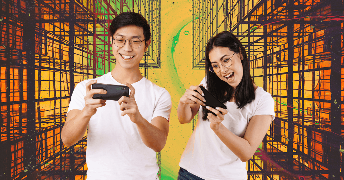 A man and a woman play games on their phones.