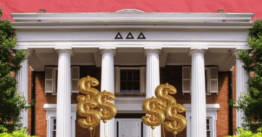 A sorority house with money sign balloons 