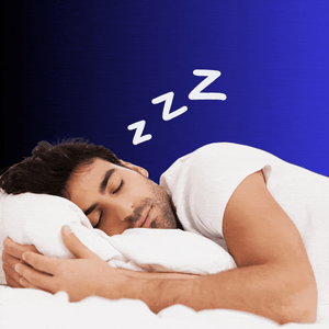 A man sleeping in bed.