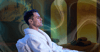 A man in a white spa robe