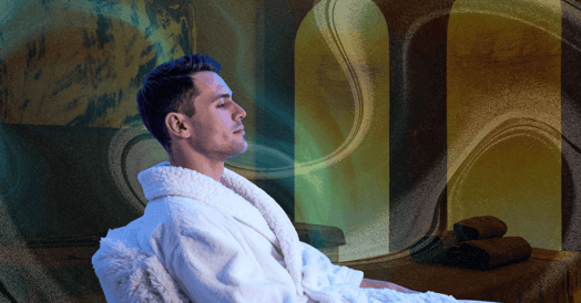 A man in a white spa robe