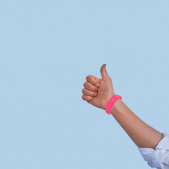 Hands giving thumbs ups with wearable bracelets