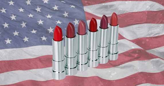 Silver lipstick tubes against a US flag backdrop.