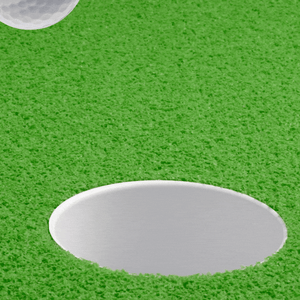golf ball going into the hole