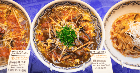 Three bowls of ramen