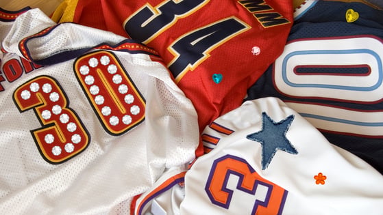 Several sports jerseys