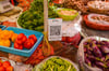 A QR code on display at a fruit market