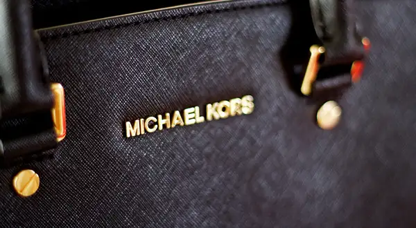 Oh, you huh? Michael Kors challenges Euro-fashion $2.35B Versace acquisition