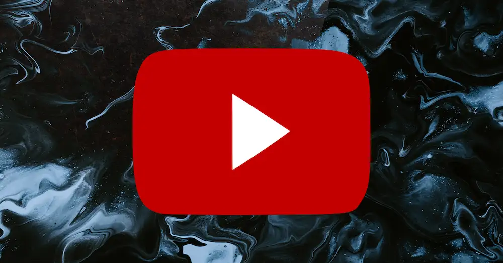 A red play button over a black-and-white swirl background.